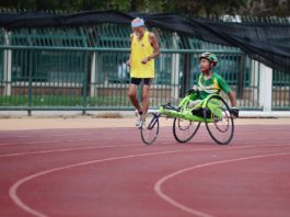 running race with wheelchair